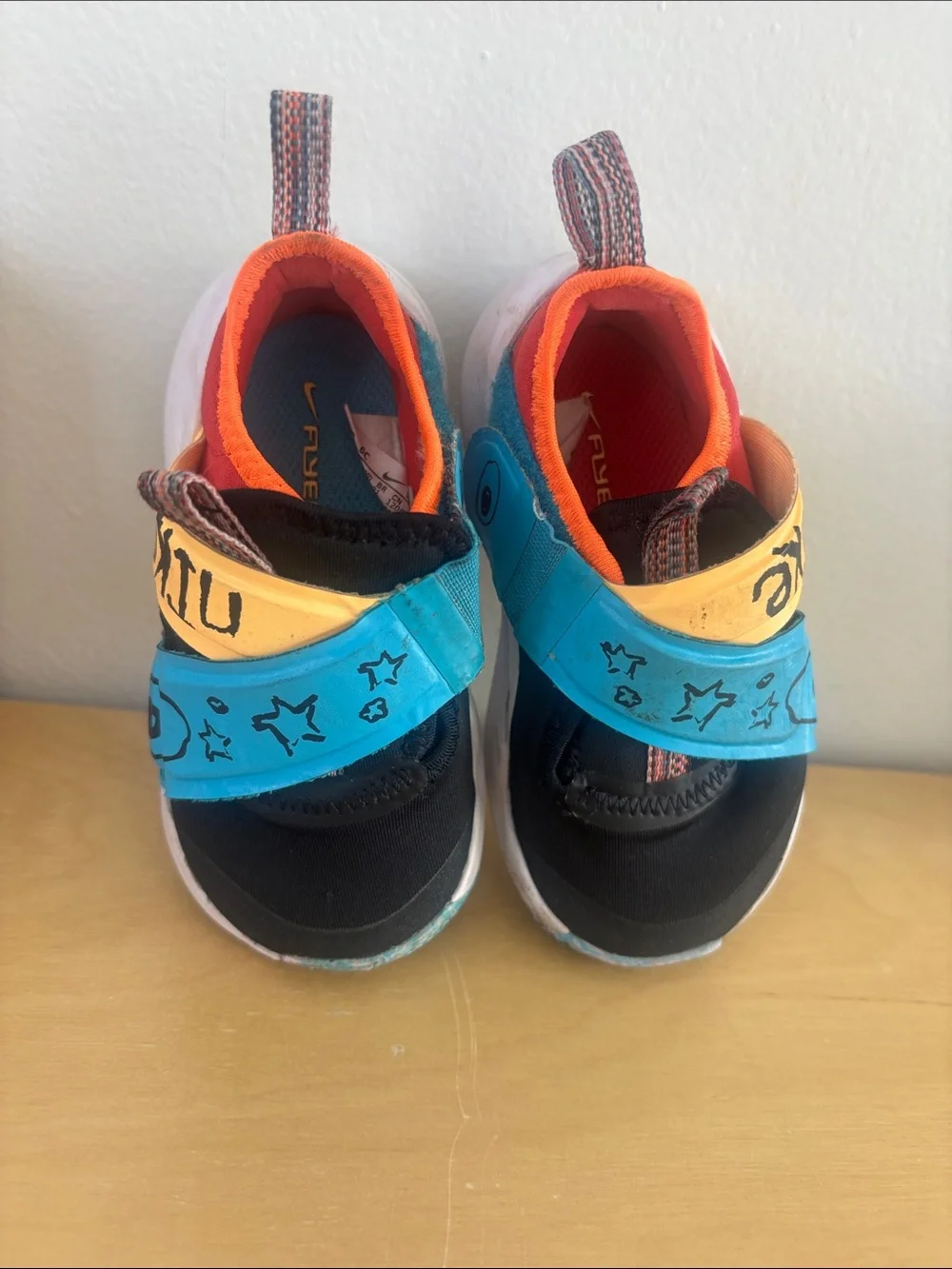 Nike Kids Black, Blue, Yellow and Red Slip-On Sneakers